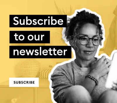 Woman with glasses looking at a laptop beside bold 'Subscribe to our newsletter' text and a small Subscribe button.